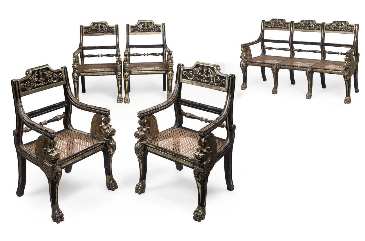 AN EBONISED, PARCEL-GILT AND CANED SUITE