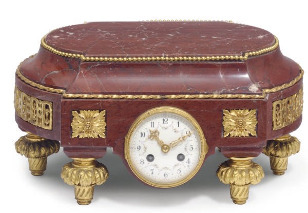 A FRENCH GILT-BRONZE MOUNTED ROUGE GRIOTTE MANTEL CLOCK PLINTH