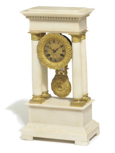 A French brass striking eight day mantel clock