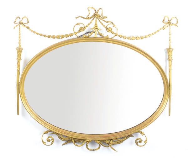 A GILTWOOD AND COMPOSITION OVAL MIRROR