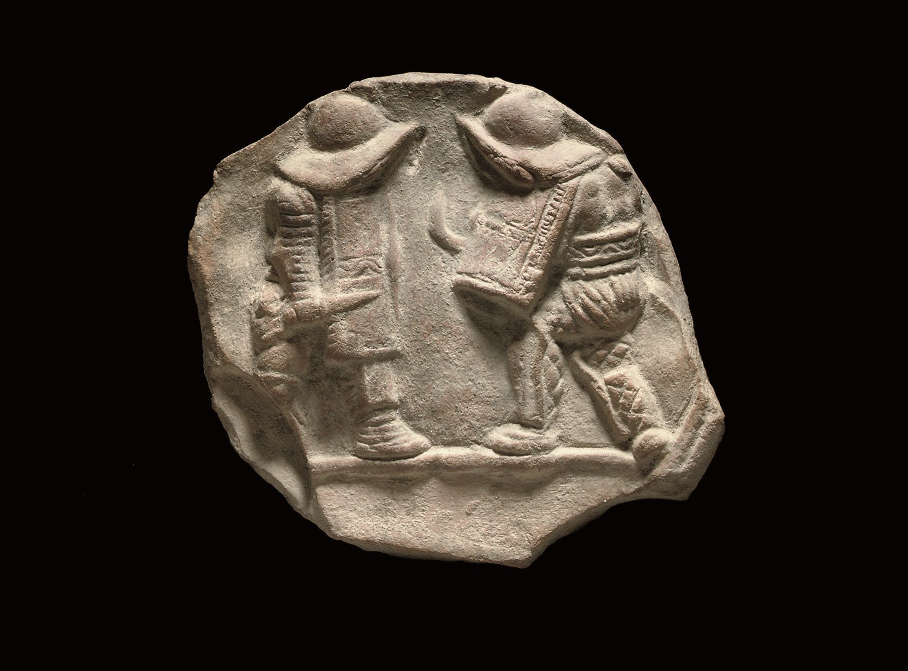 A ROMAN TERRACOTTA GLADIATOR RELIEF MEDALLION
