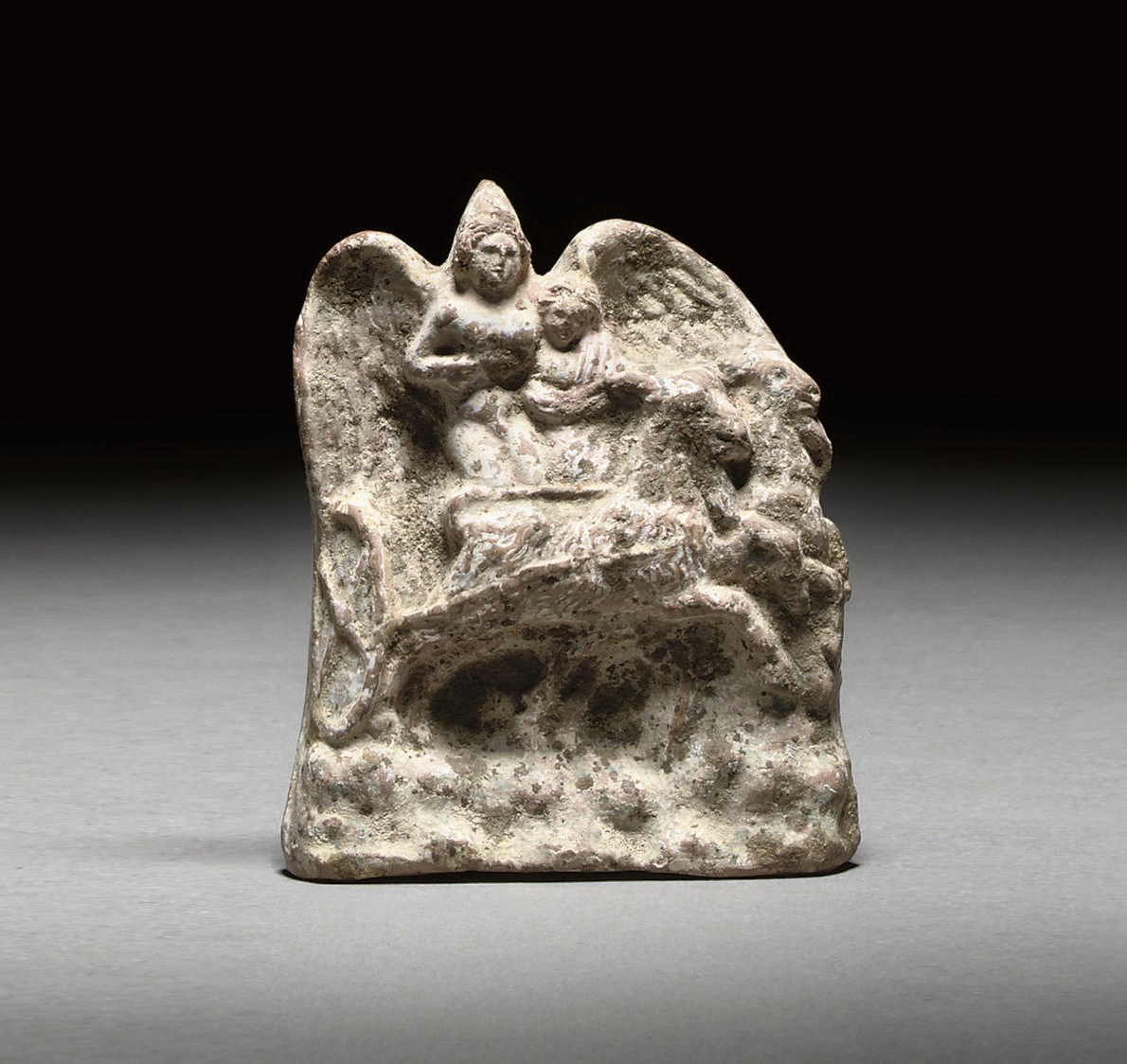 A GREEK TERRACOTTA CHARIOT GROUP