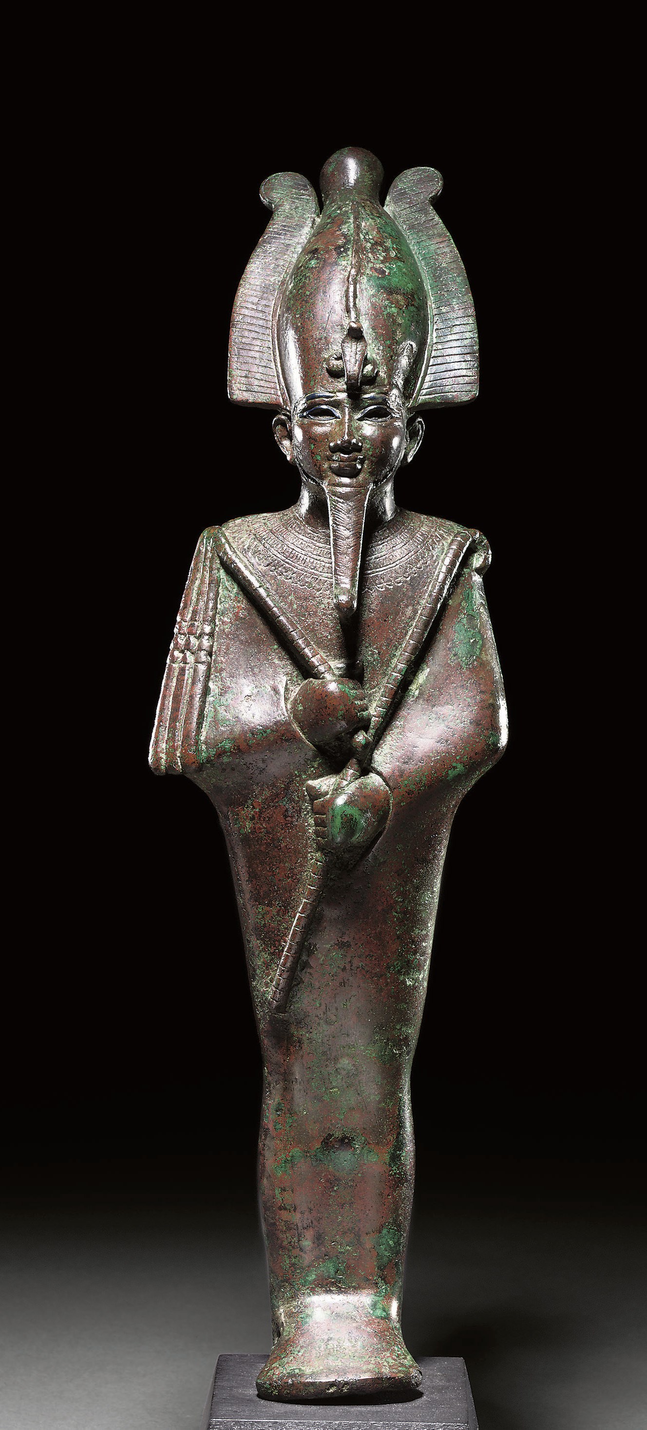 A LARGE EGYPTIAN BRONZE FIGURE OF OSIRIS