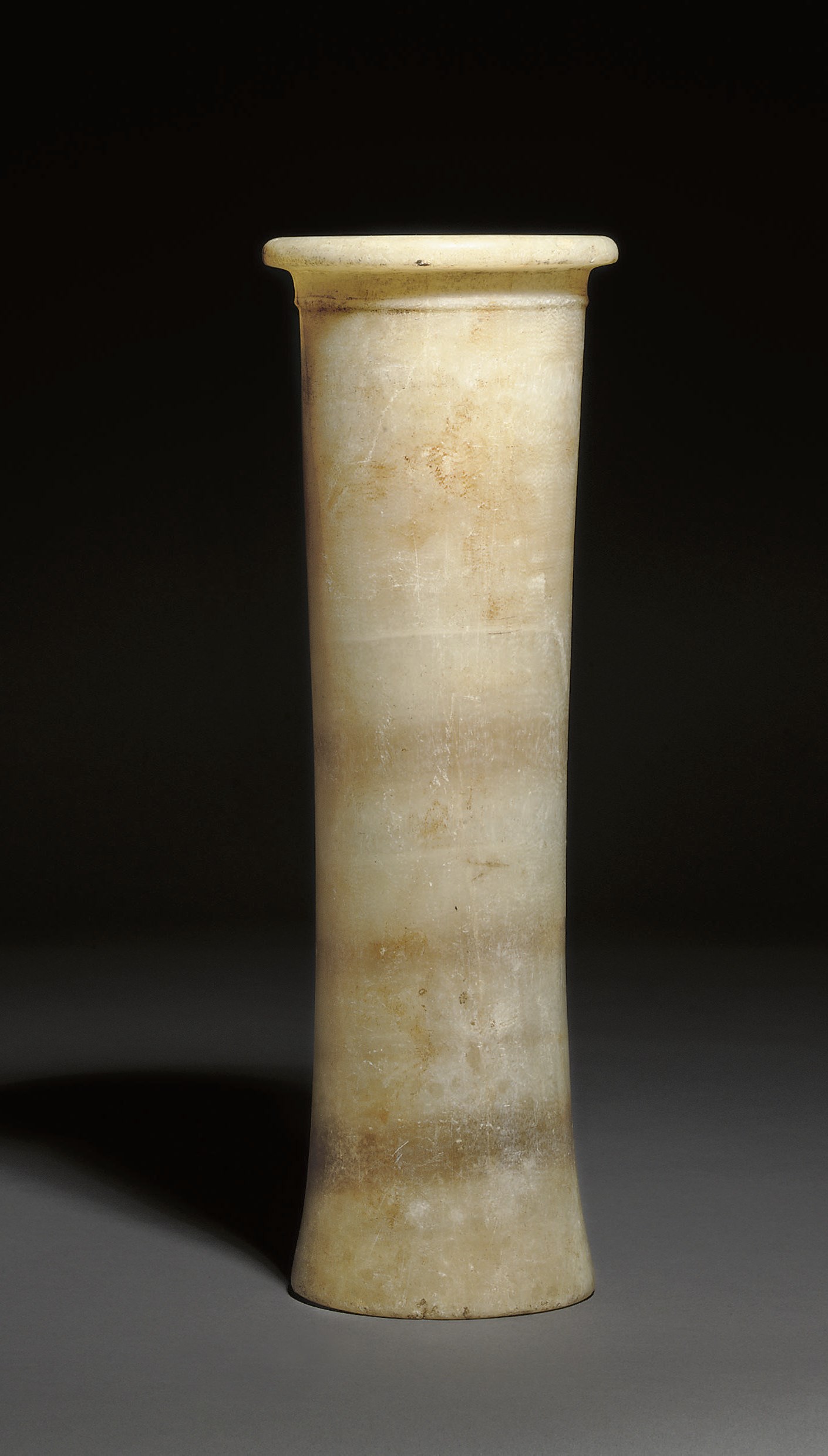 AN EGYPTIAN BANDED ALABASTER JAR