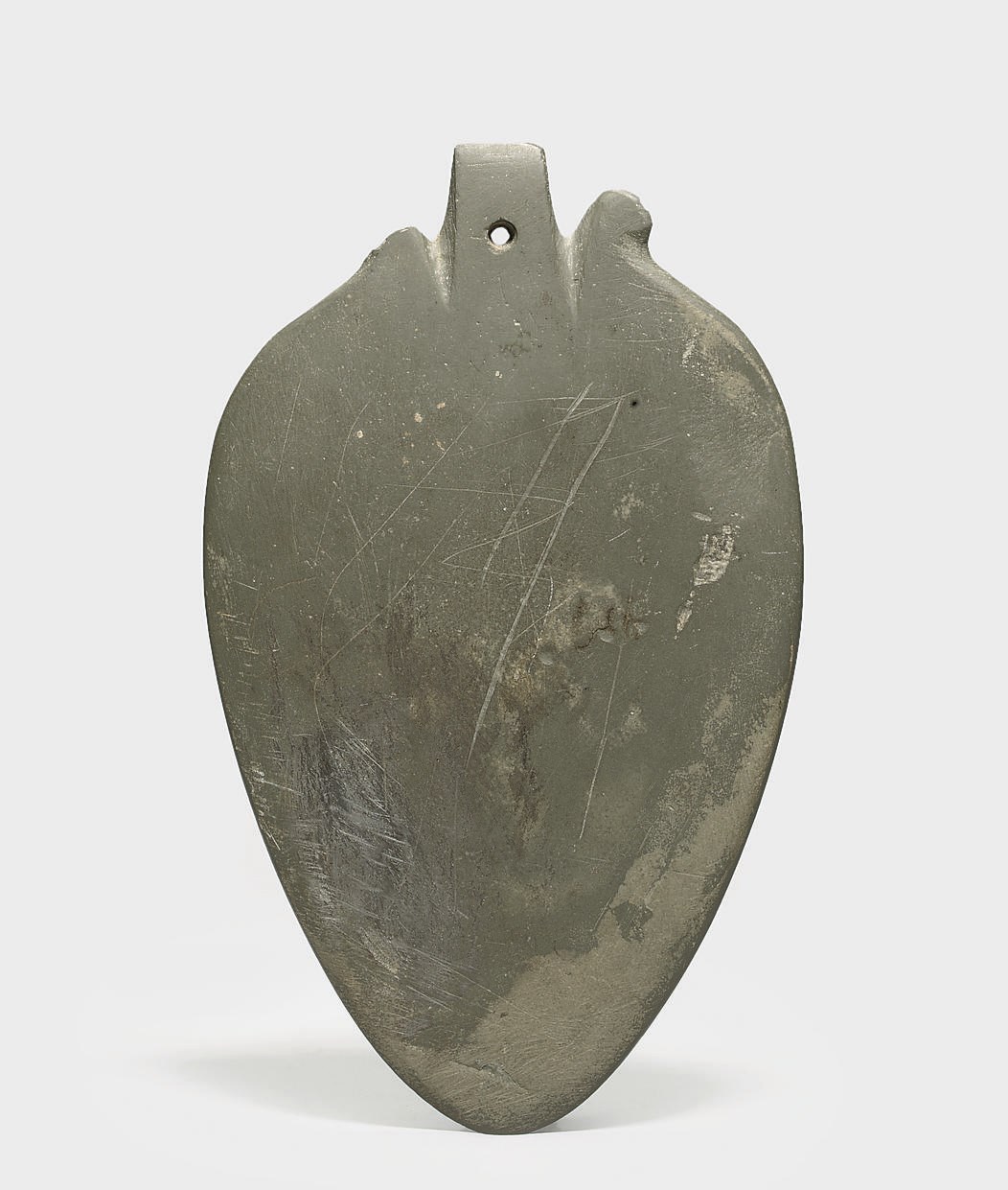 AN EGYPTIAN SCHIST COSMETIC PALETTE