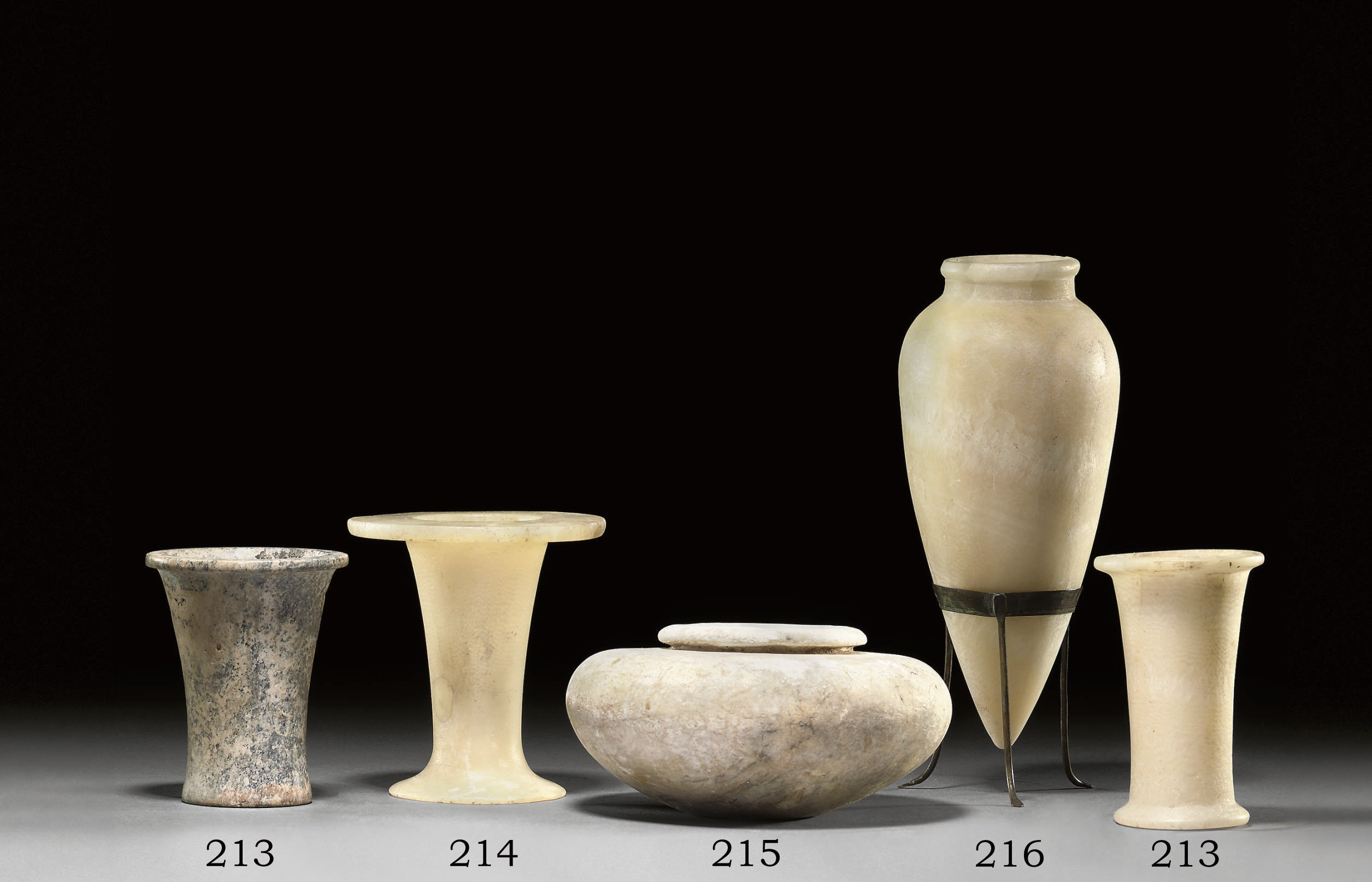 AN EGYPTIAN ALABASTER UNGUENT JAR