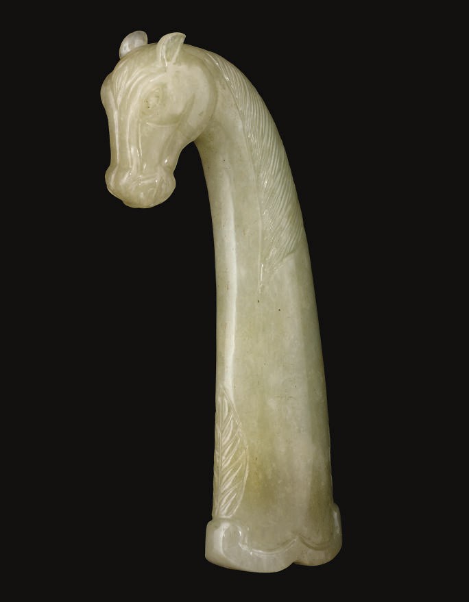 A JADE HORSE-HEAD DAGGER HILT, INDIA, 19TH CENTURY