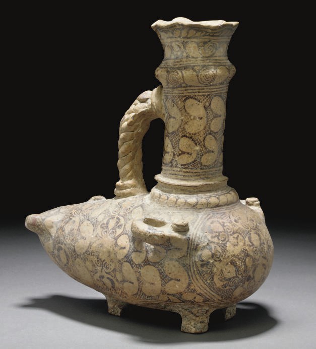 AN UNGLAZED SLIP-PAINTED POTTERY EWER, NISHAPUR, 10TH CENTURY