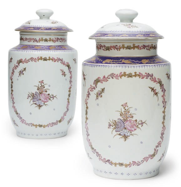 A PAIR OF CONTINENTAL PORCELAIN VASES AND COVERS