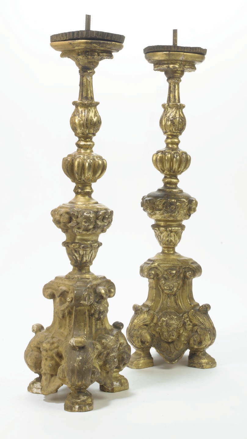 A PAIR OF ITALIAN GILTWOOD ALTAR STICKS