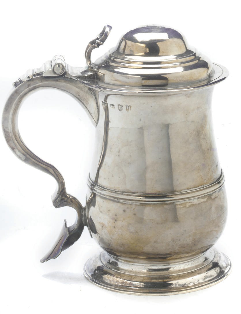 A GEORGE II SILVER TANKARD