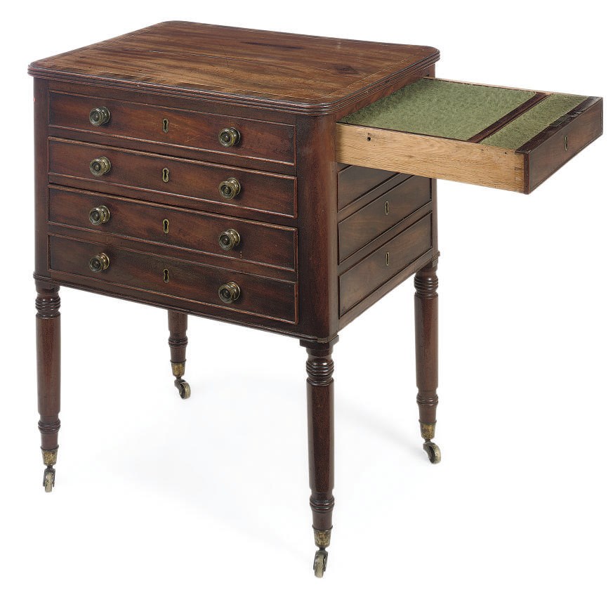 A REGENCY MAHOGANY AND CROSSBANDED WRITING TABLE