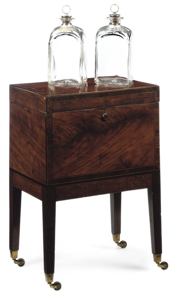 A REGENCY MAHOGANY AND ROSEWOOD CROSSBANDED CELLARET ON LATER STAND