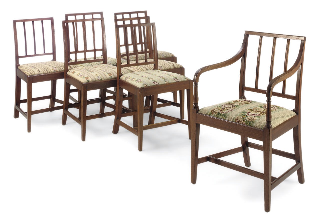 A SET OF SEVEN GEORGE III MAHOGANY DINING CHAIRS