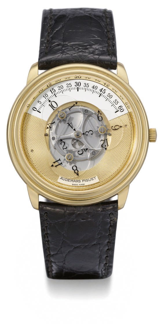 Audemars Piguet. An unusual 18K gold self-winding wandering hour wristwatch