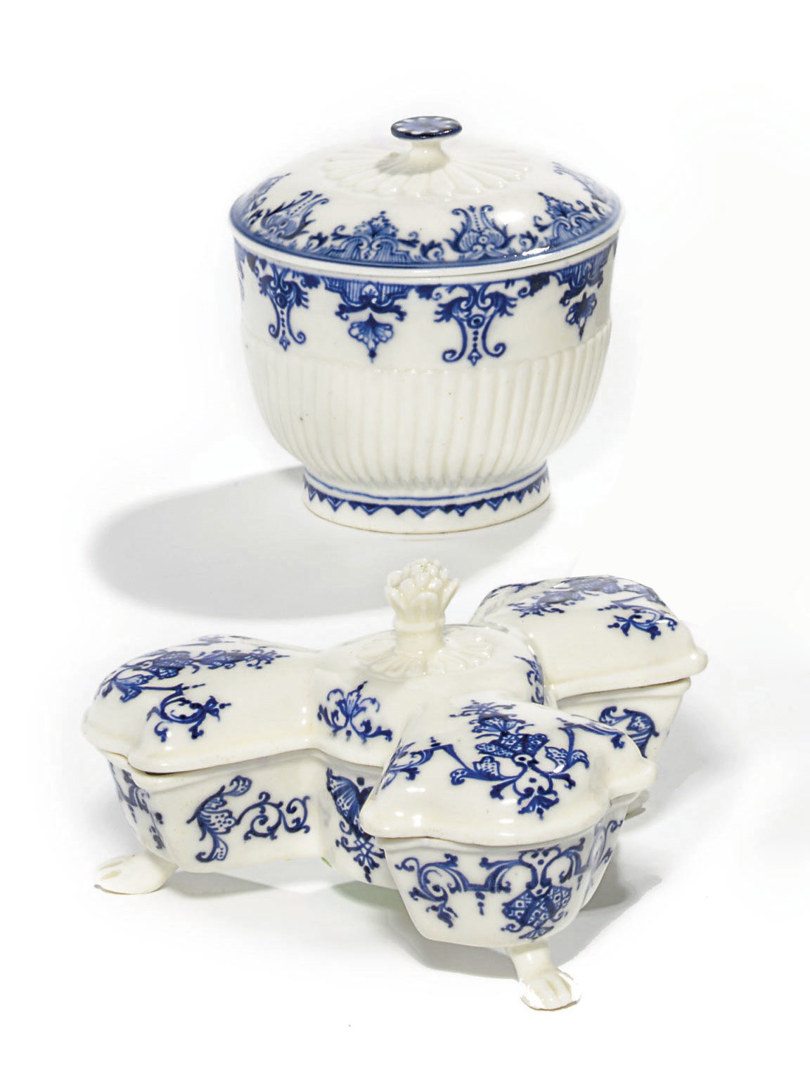 A SAINT-CLOUD TRIPLE SPICE-BOX AND COVER AND RIBBED SUGAR-BOWL AND COVER