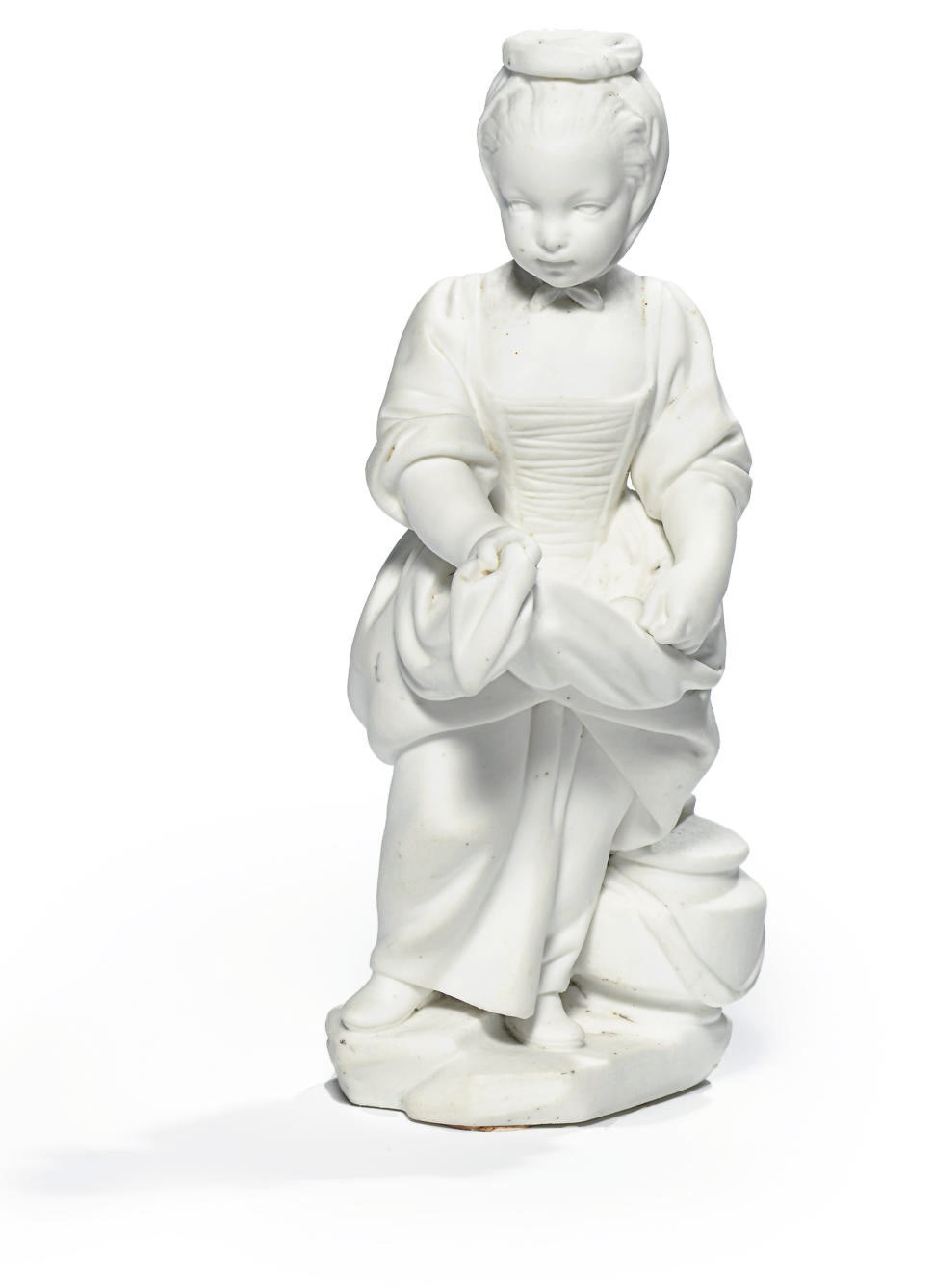A SEVRES BISCUIT FIGURE OF AN EGG SELLER (LA COQUETIERE)