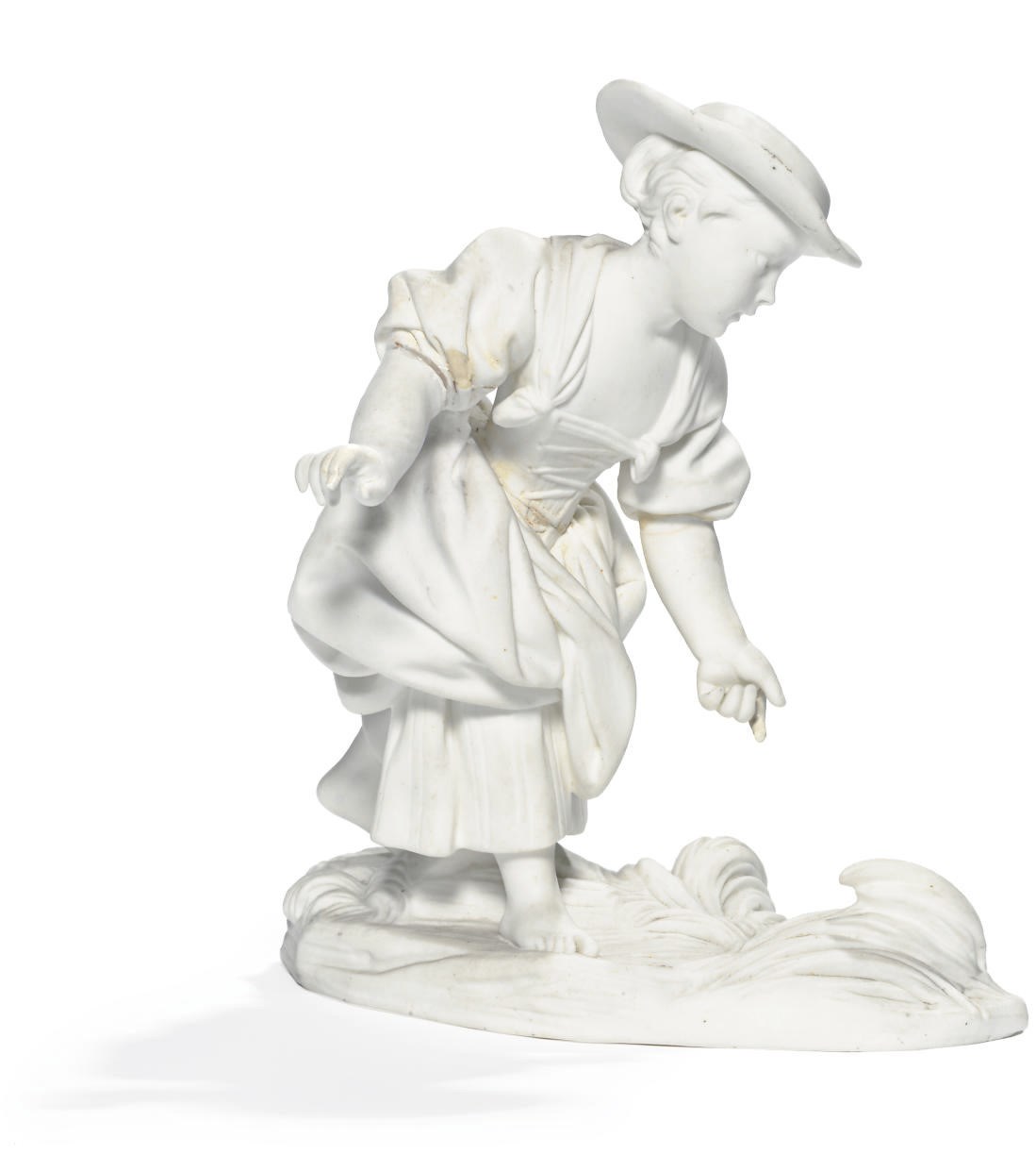 A SEVRES BISCUIT FIGURE OF A PEASANT GIRL SOWING
