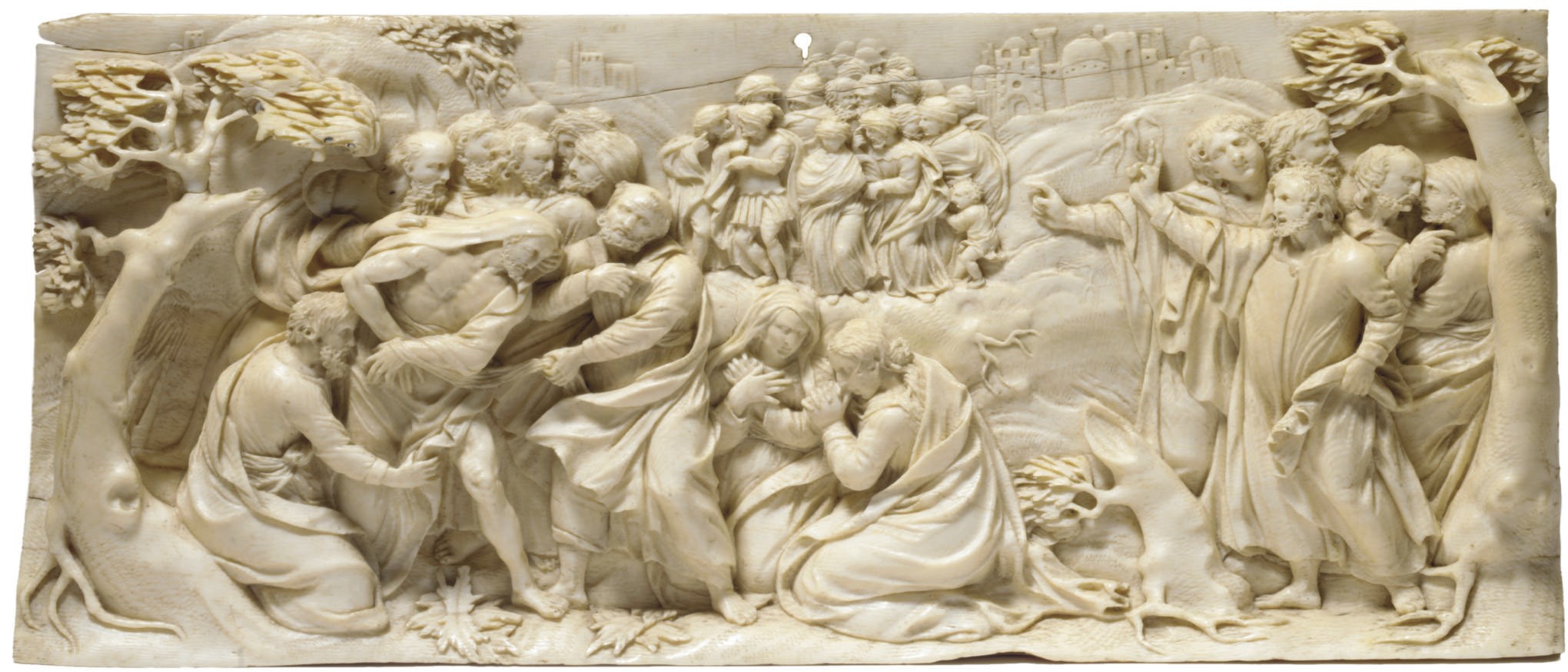 A GERMAN IVORY RELIEF OF CHRIST BEFORE ANNAS**