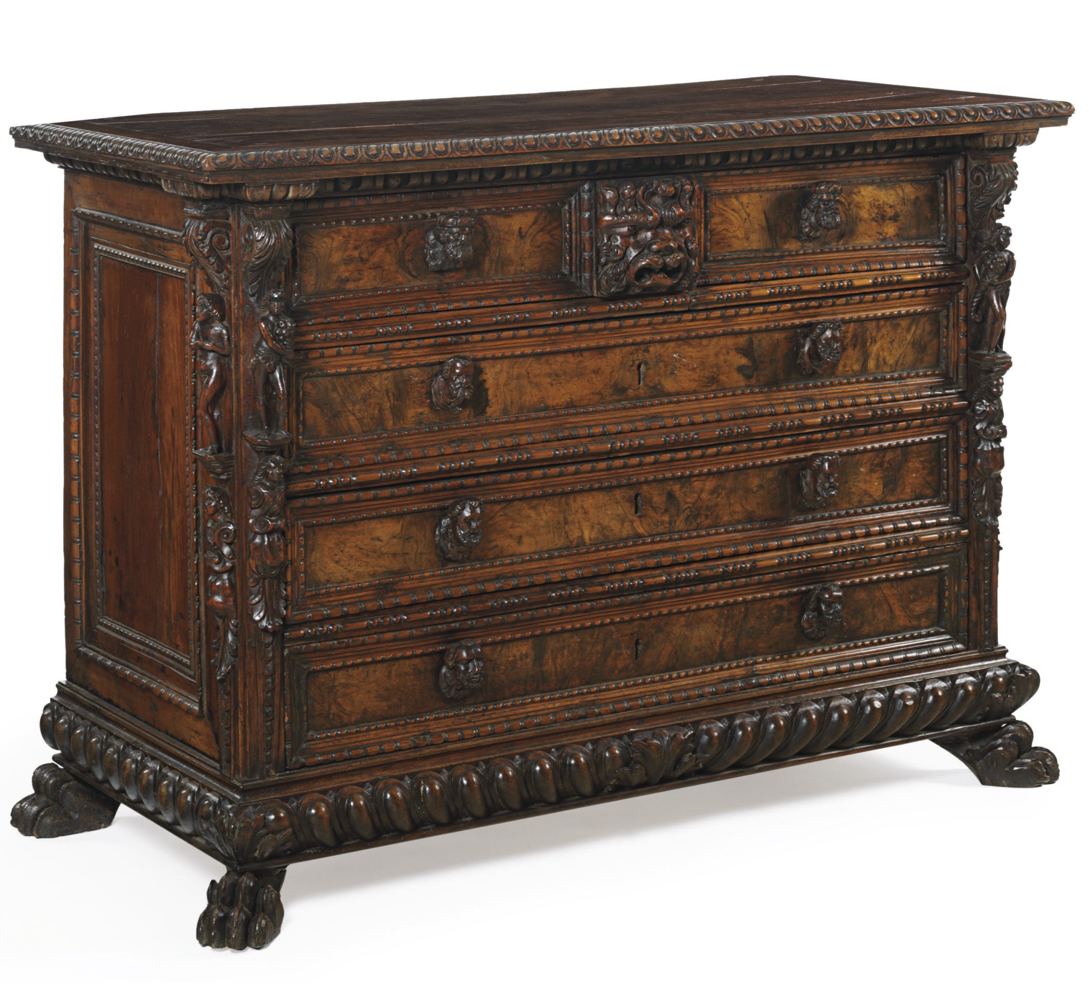 AN ITALIAN WALNUT CHEST OF DRAWERS