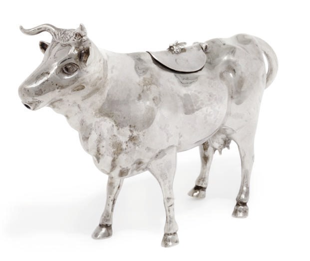 A LATE VICTORIAN SILVER COW CREAMER