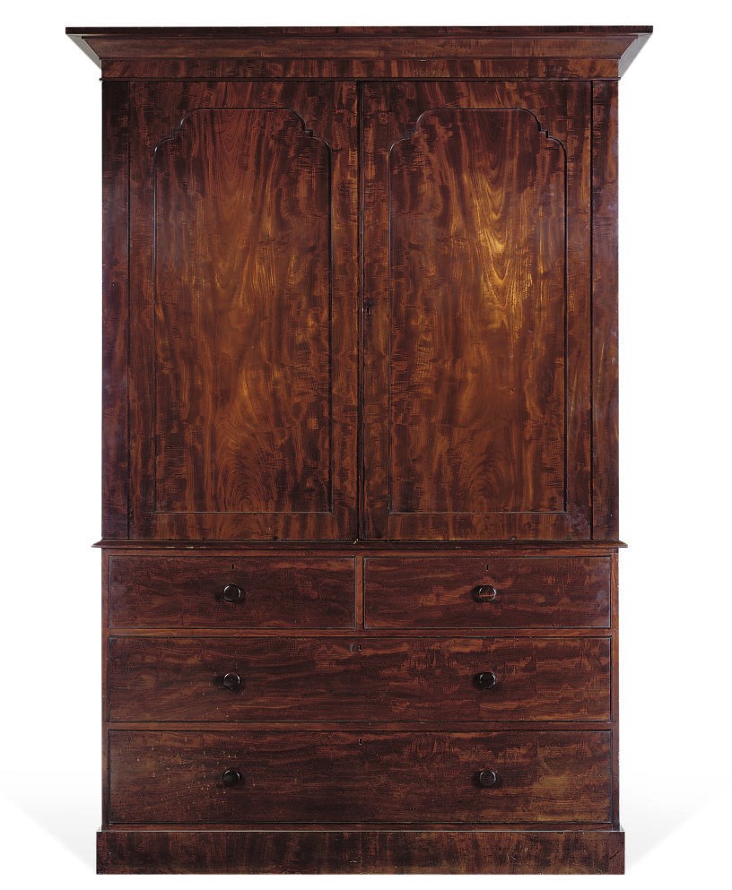 AN EARLY VICTORIAN MAHOGANY LINEN PRESS