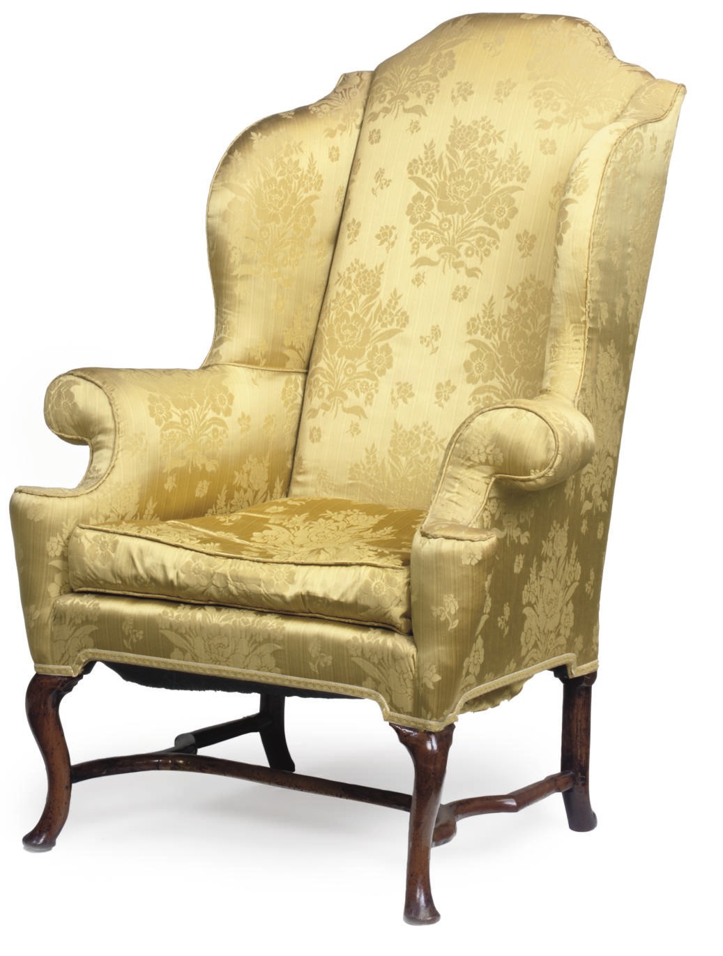 A QUEEN ANNE WALNUT WING ARMCHAIR