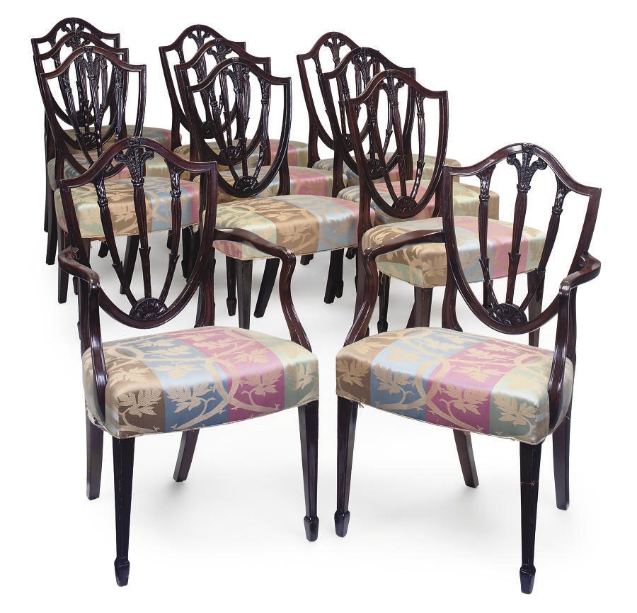 A SET OF ELEVEN GEORGE III MAHOGANY DINING CHAIRS