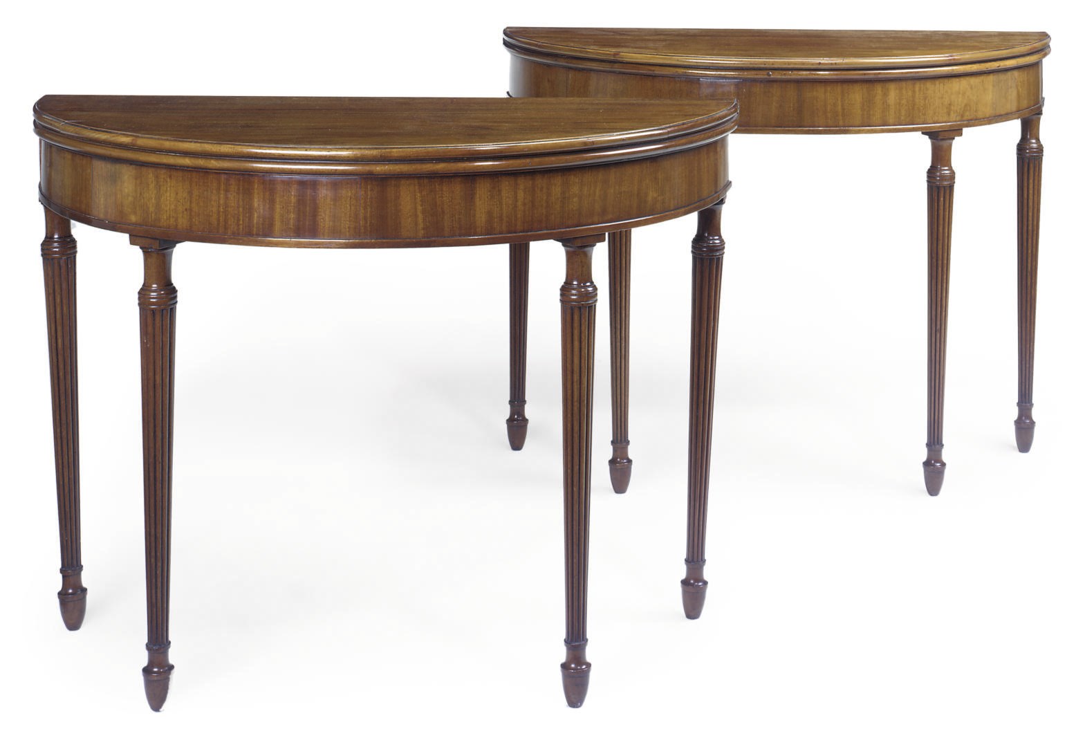 A PAIR OF REGENCY MAHOGANY SEMI-ELIPTICAL GAMES TABLES