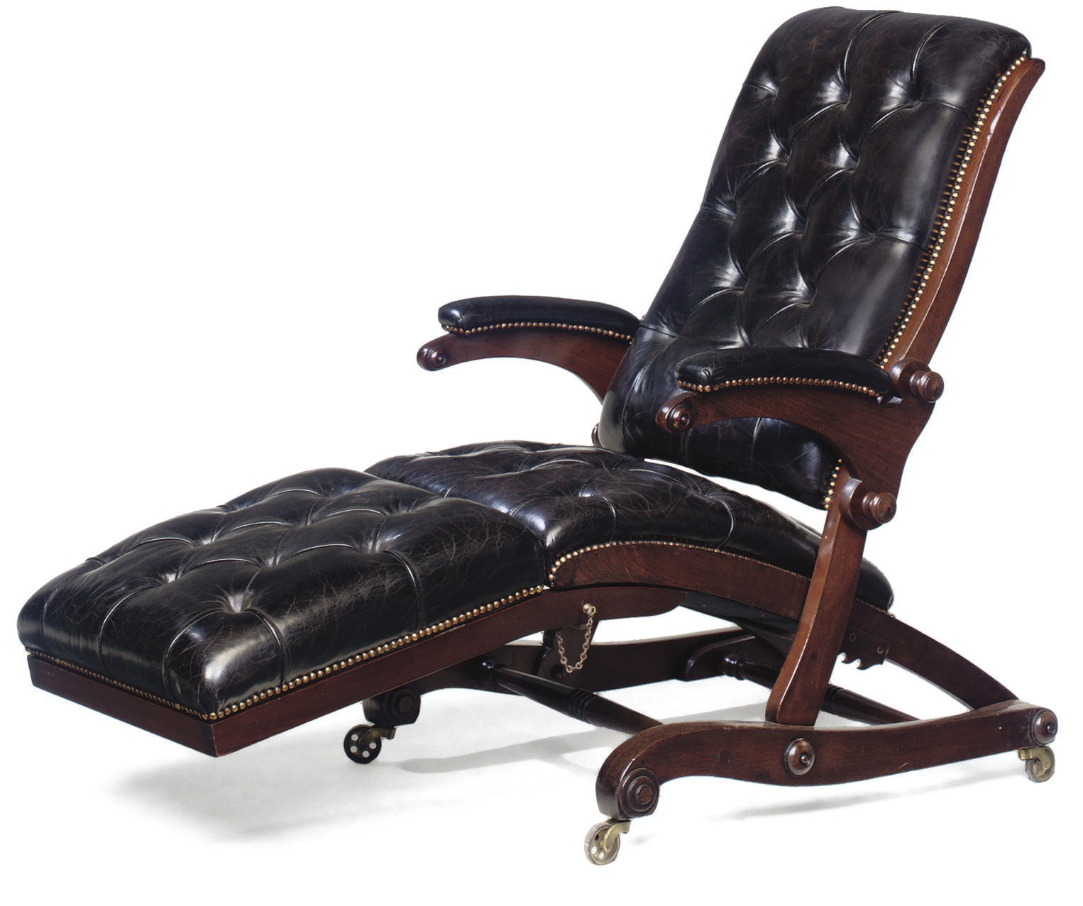 A VICTORIAN MAHOGANY AND BLACK LEATHER UPHOLSTERED RECLINING ARMCHAIR