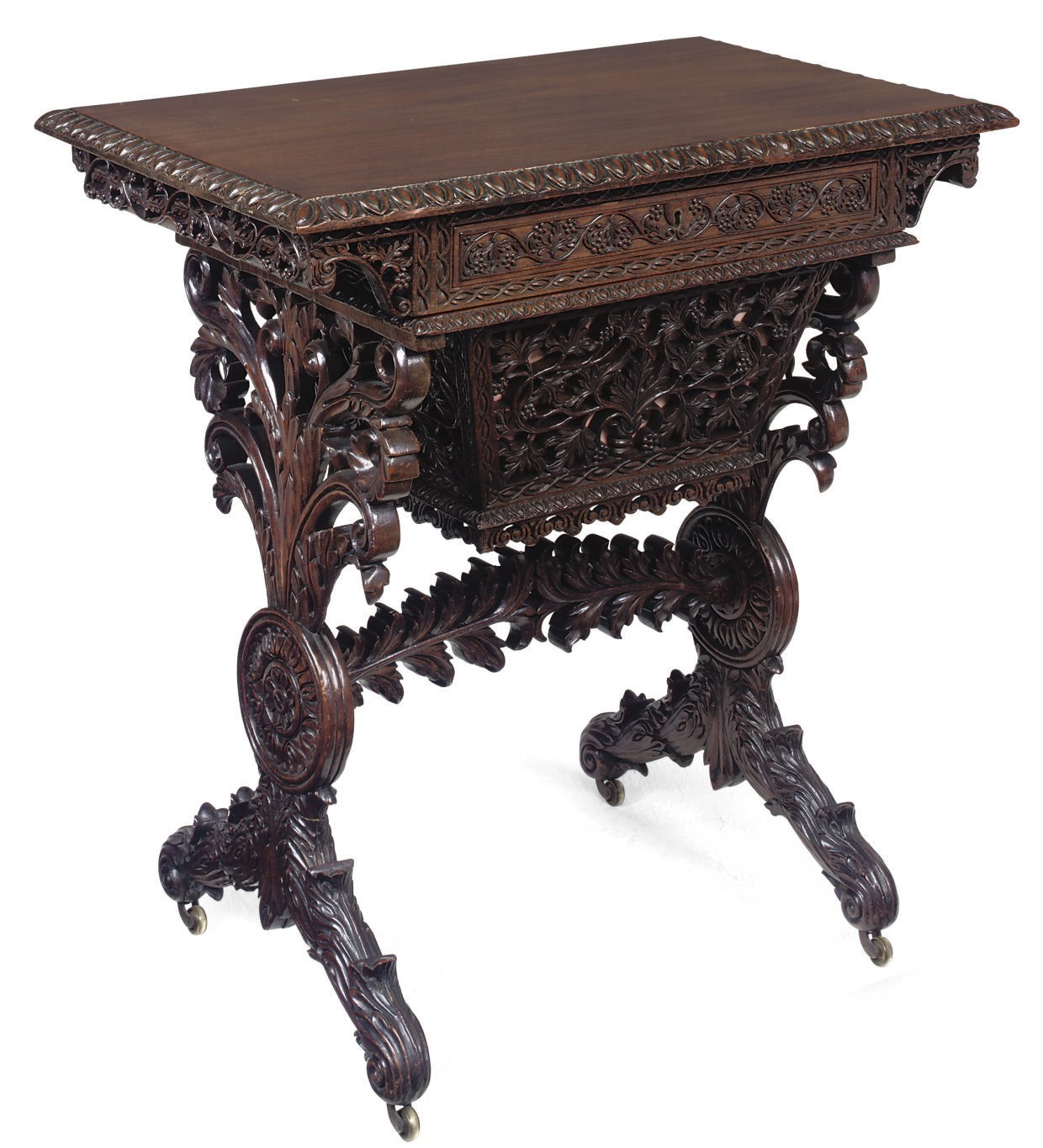 AN ANGLO-INDIAN CARVED ROSEWOOD WORK TABLE