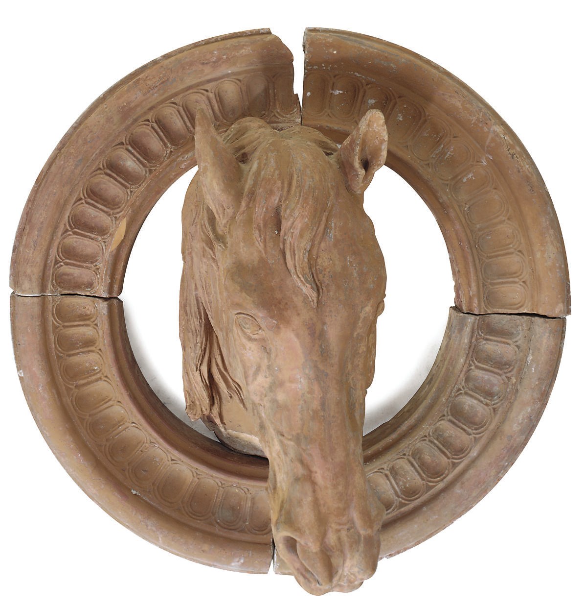 A TERRACOTTA MODEL OF A HORSE'S HEAD