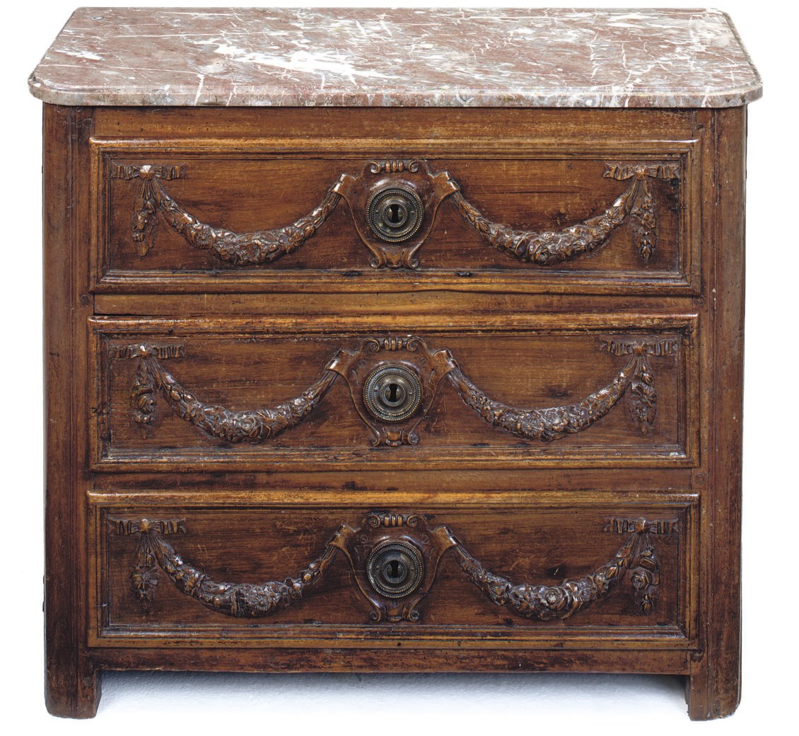 A LOUIS XV CHESTNUT COMMODE