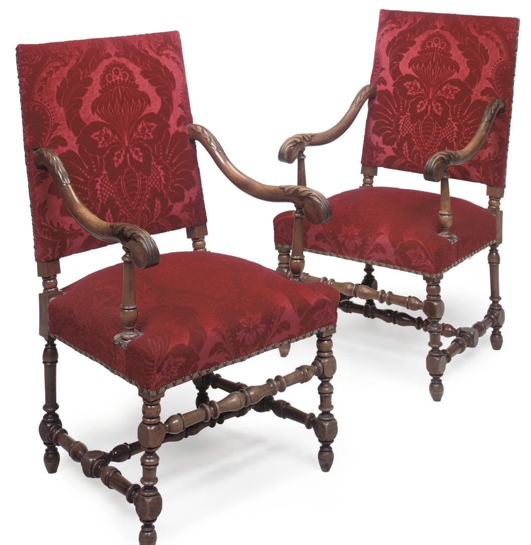 A PAIR OF FRENCH OR NORTH ITALIAN WALNUT AND UPHOLSTERED ARMCHAIRS