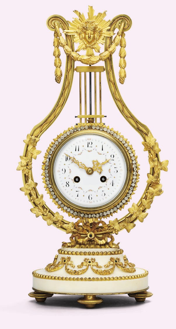 A French ormolu-mounted white marble striking eight day lyre clock