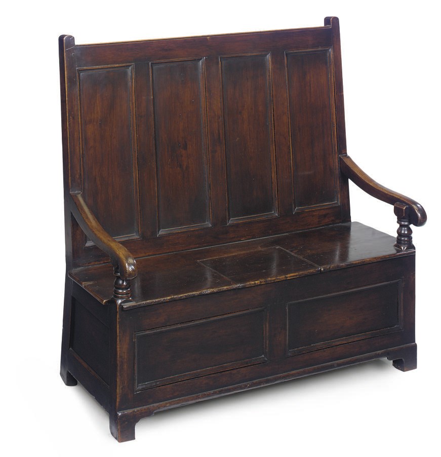 A WELSH STAINED PINE BOX SEAT SETTLE