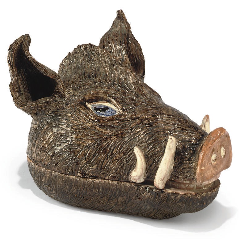 A GLAZED TERRACOTTA TUREEN IN THE FORM OF A BOAR'S HEAD