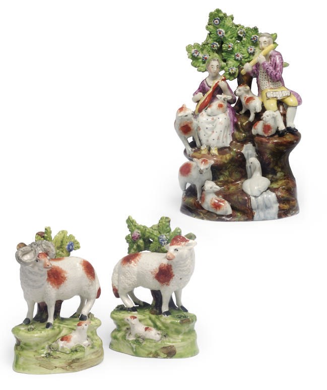 A STAFFORDSHIRE PEARLWARE SONGSTERS GROUP AND A PAIR OF CREAMWARE EWE AND LAMB GROUPS