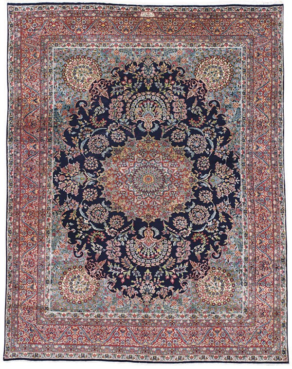 A fine Rashid Faroughi Kirman carpet