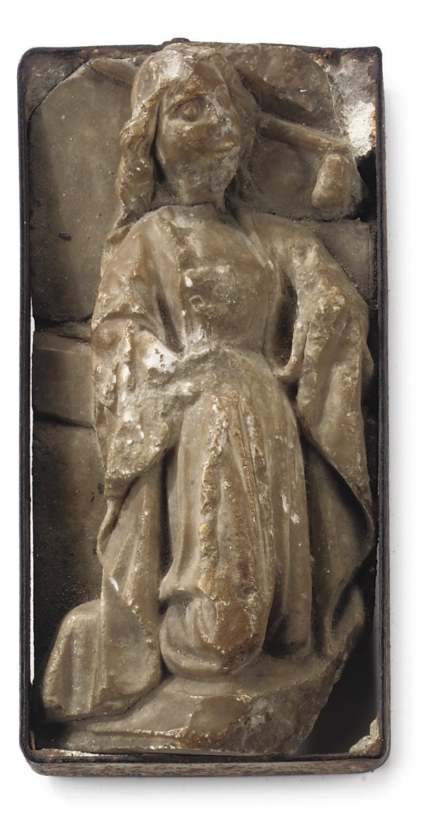 AN ALABASTER FRAGMENT OF A FEMALE SAINT