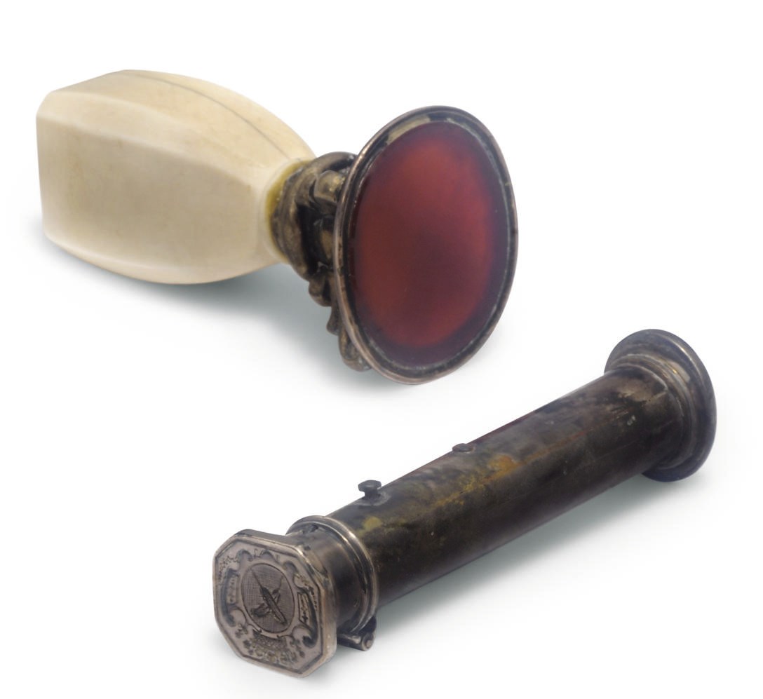 An ivory handled seal with hardstone mount