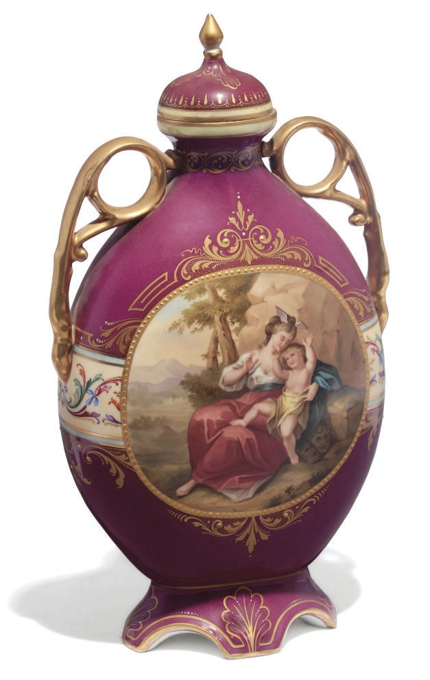 A VIENNE-STYLE PORCELAIN CLARET GROUND VASE AND COVER