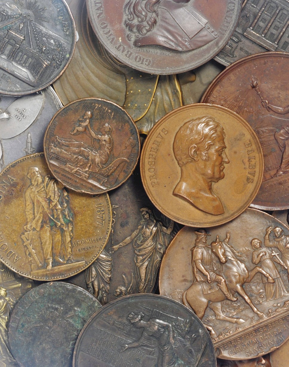 A collection of eighteen bronze medallions