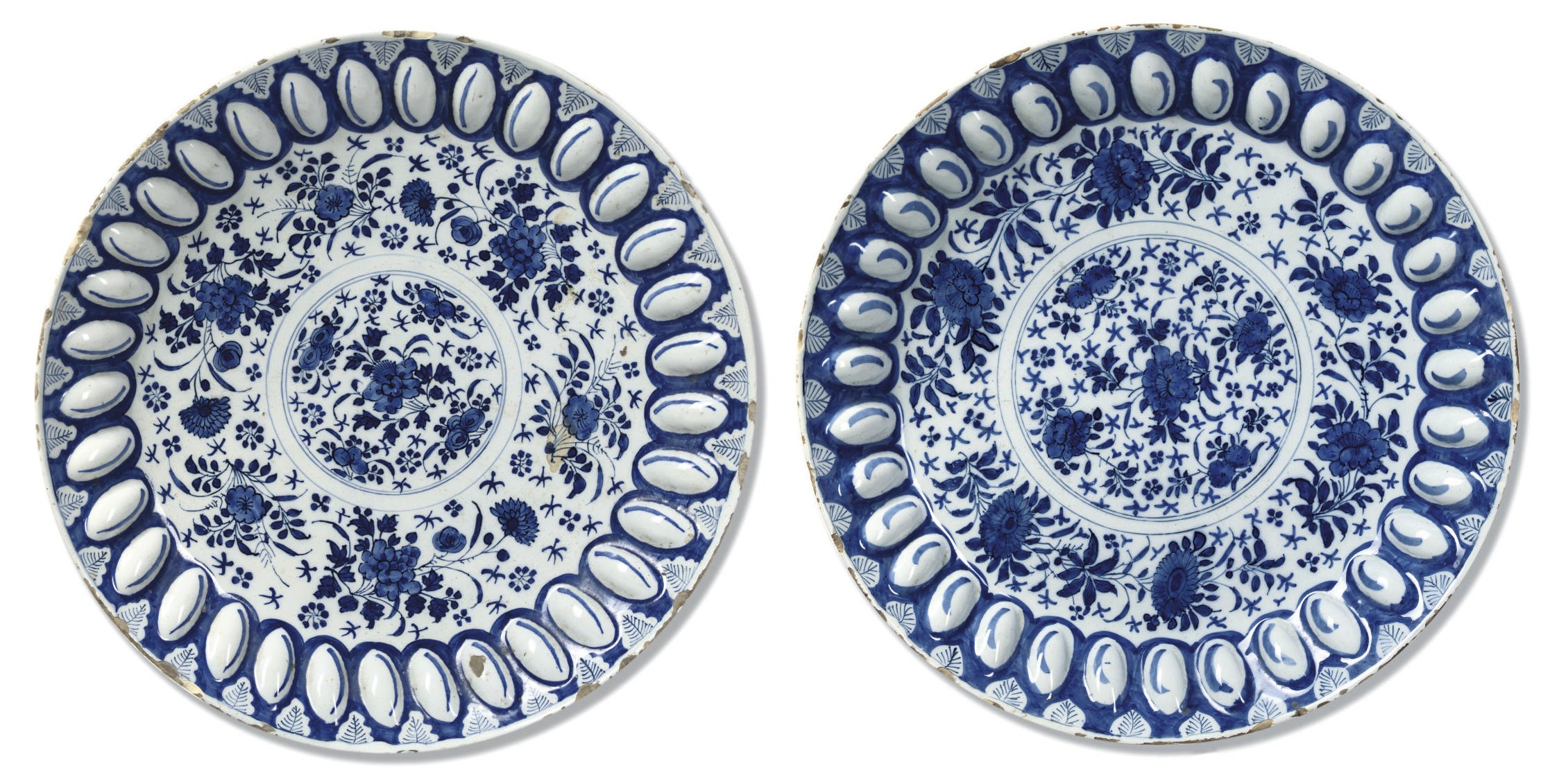 TWO ENGLISH DELFT BLUE AND WHITE CHARGERS