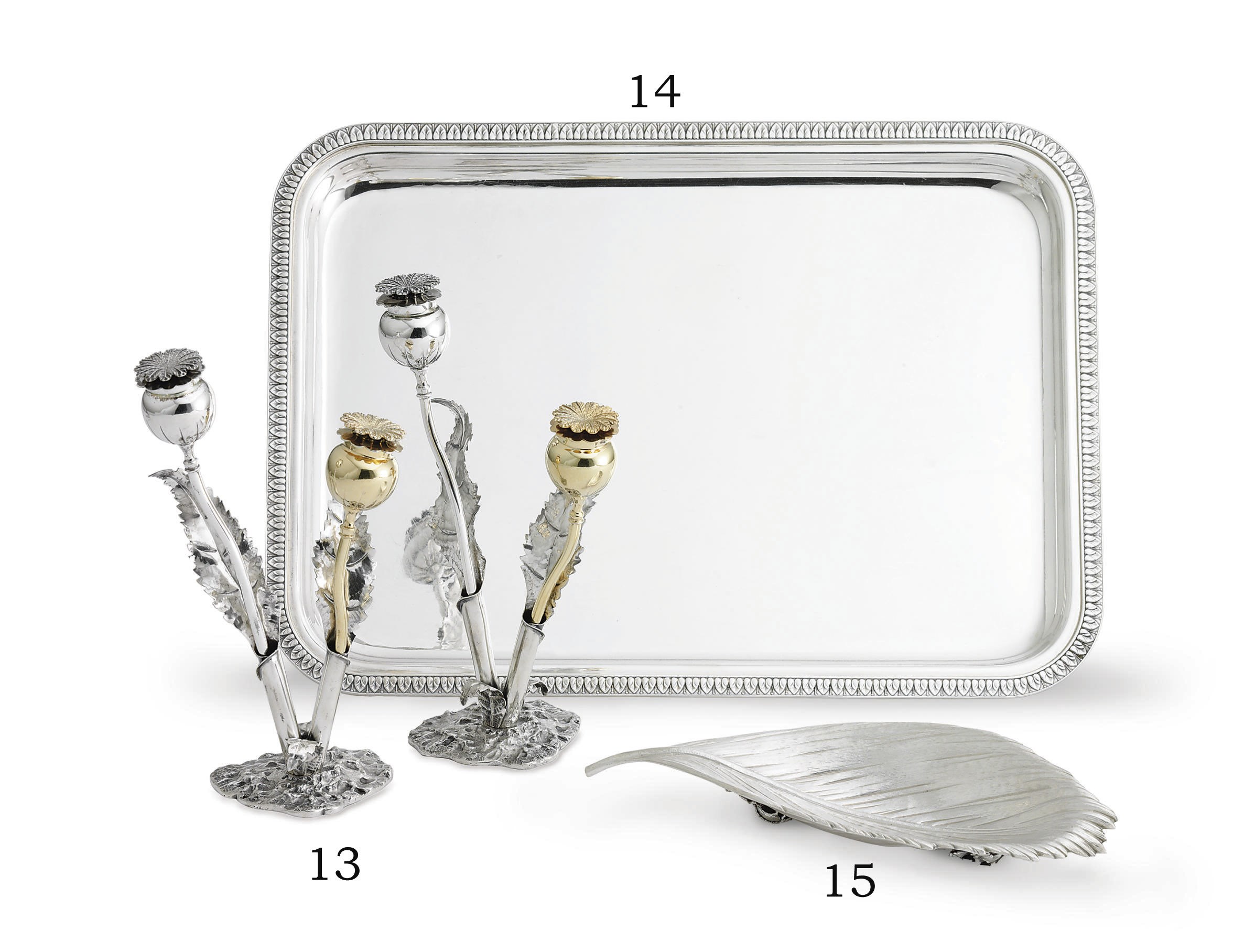 A PAIR OF ITALIAN SILVER AND SILVER-GILT POPPY-FORM SALT AND PEPPER SHAKERS