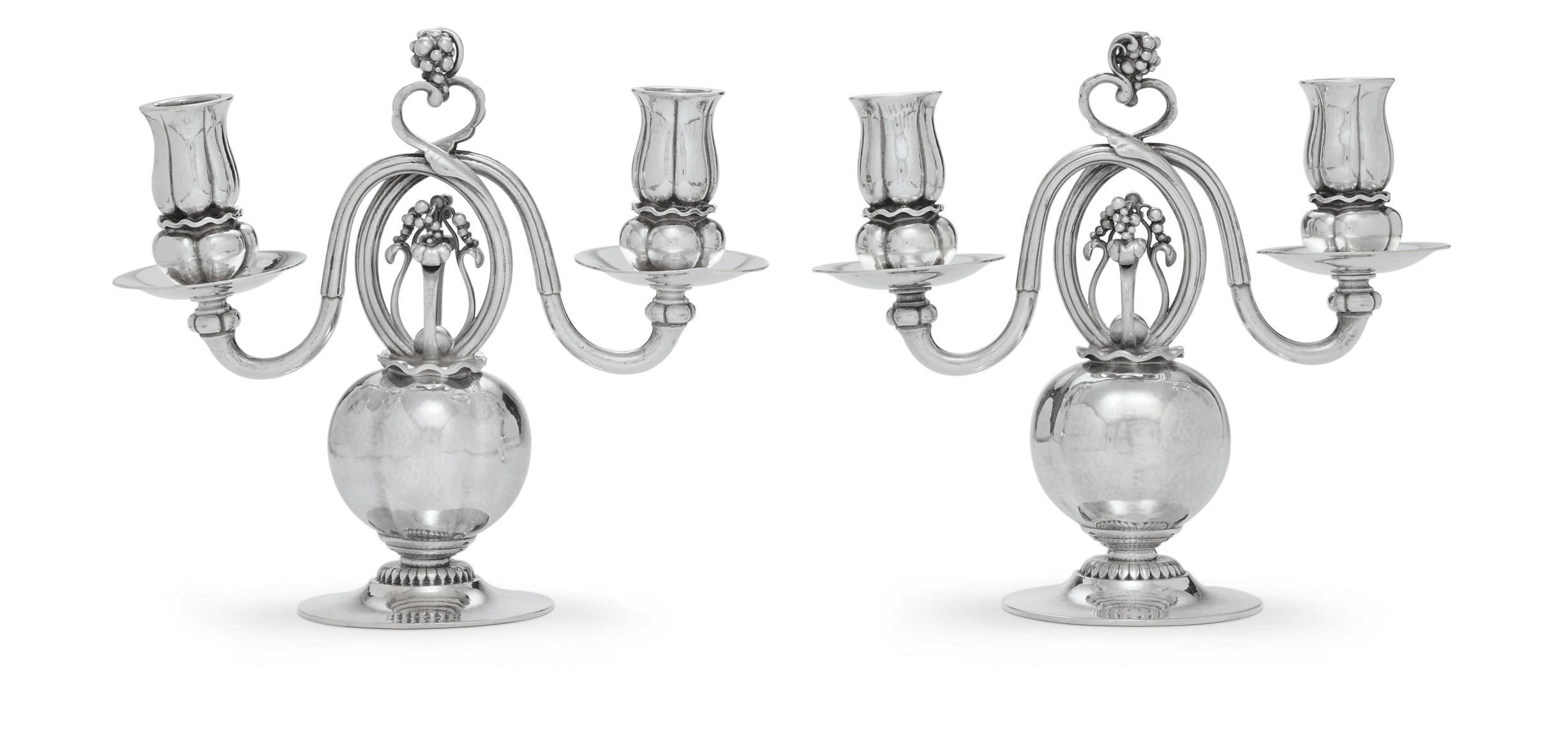 A PAIR OF DANISH SILVER TWO-LIGHT CANDELABRA DESIGNED BY GEORG JENSEN