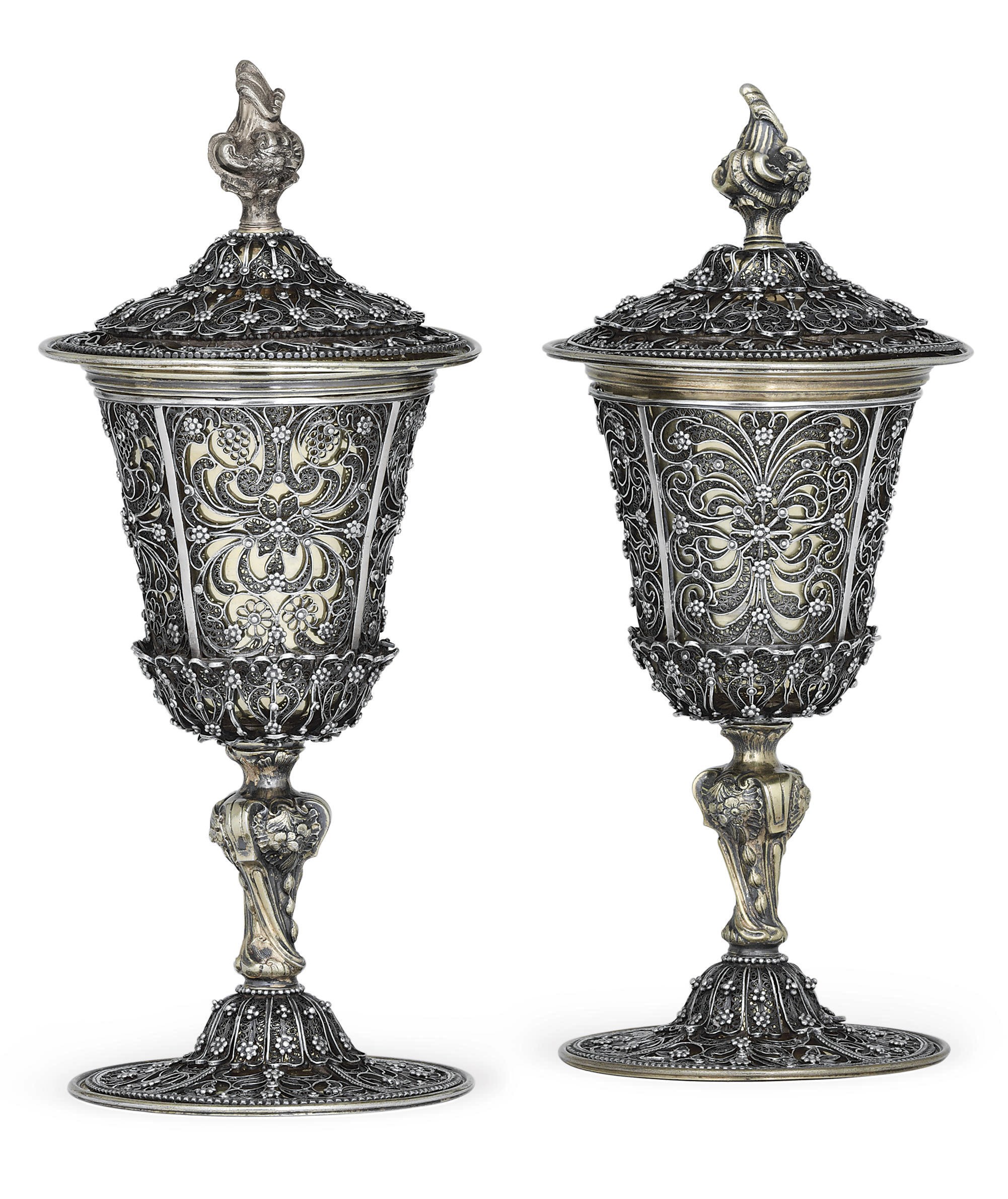 A RARE PAIR OF GERMAN SILVER-GILT AND SILVER FILIGREE CUPS AND COVERS