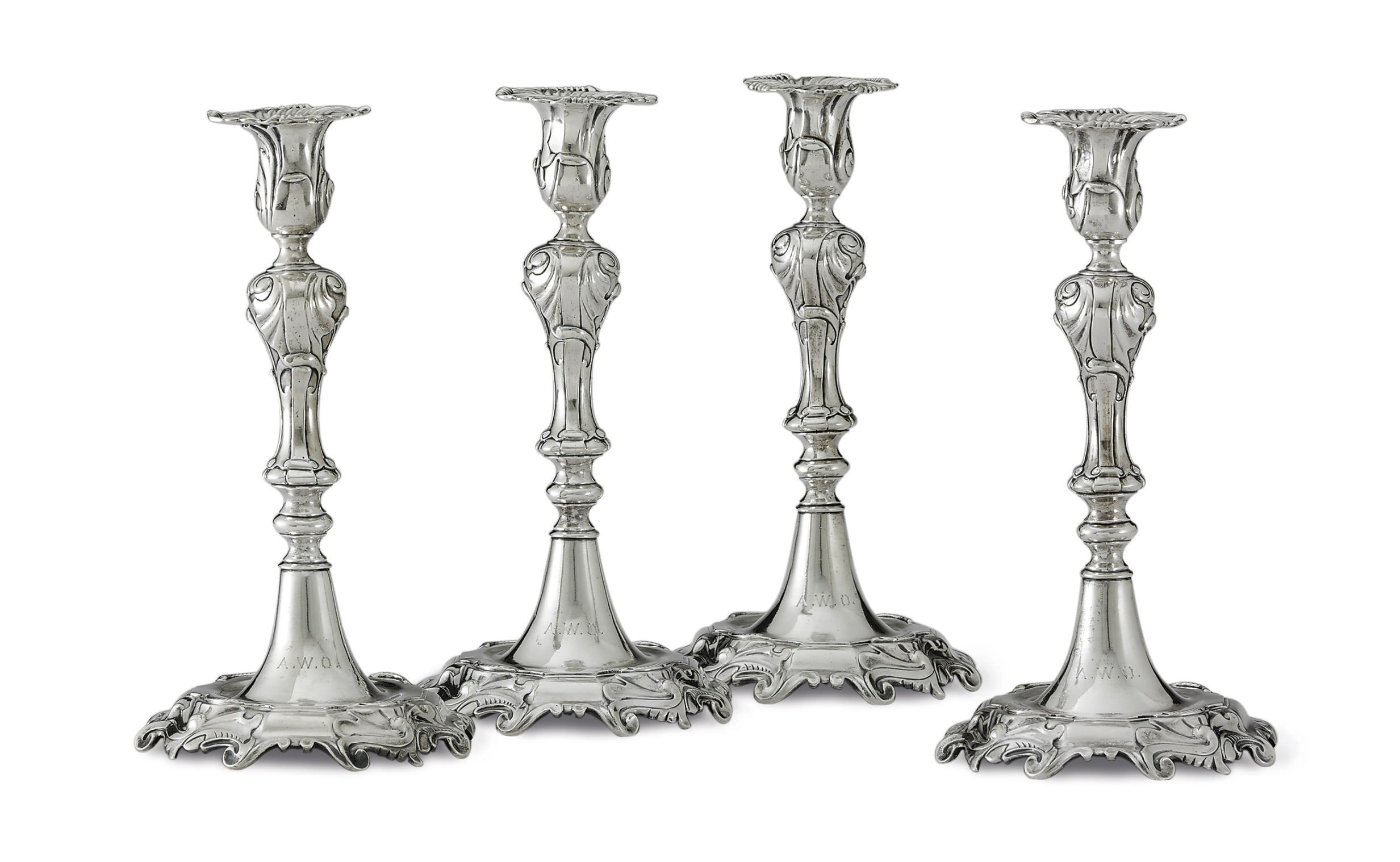 A SET OF FOUR DUTCH SILVER CANDLESTICKS