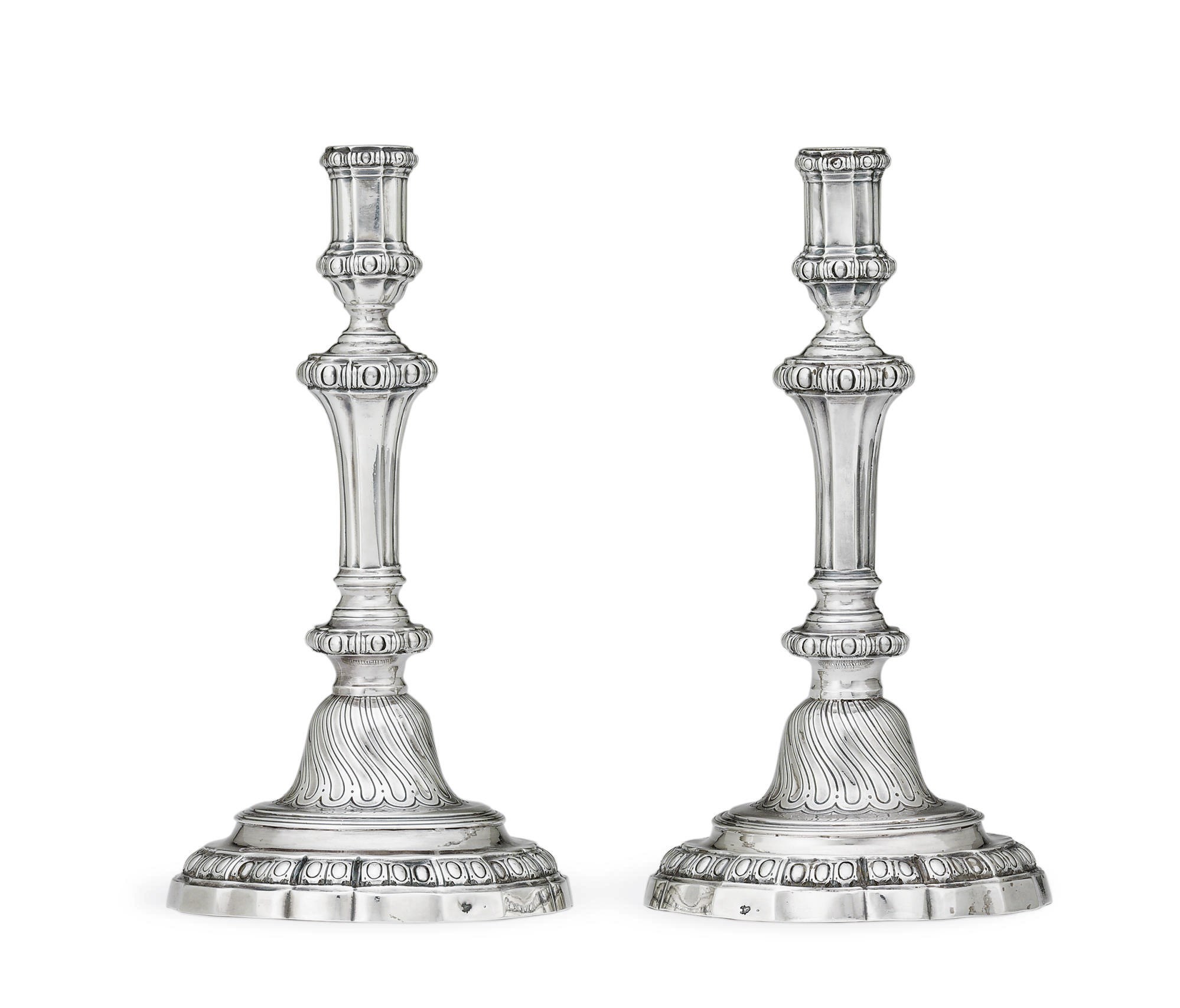 A PAIR OF LOUIS XVI SILVER CANDLESTICKS