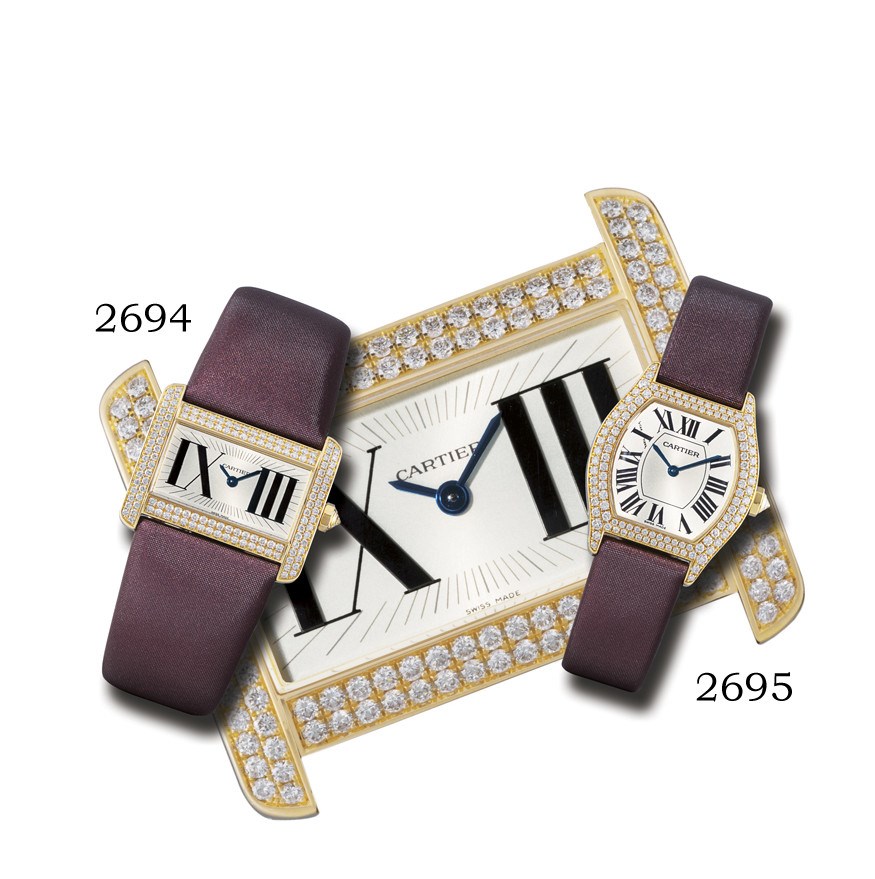 CARTIER, "MINI TANK DIVAN"

LADY'S 18K GOLD AND DIAMOND-SET RECTANGULAR WRISTWATCH